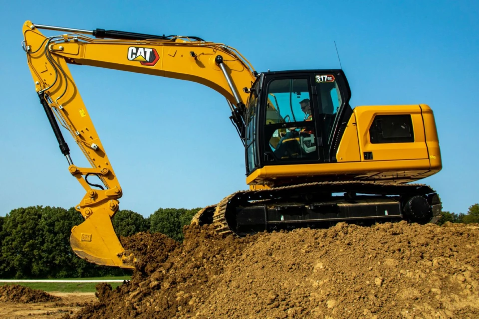 excavator final drive assembly on caterpillar machine at construction site